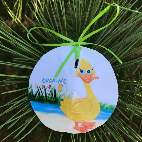 FLIRTY DUCK SAND DOLLAR ORNAMENT