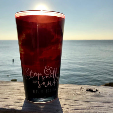 STOP & SMELL THE SUNSET PINT GLASS